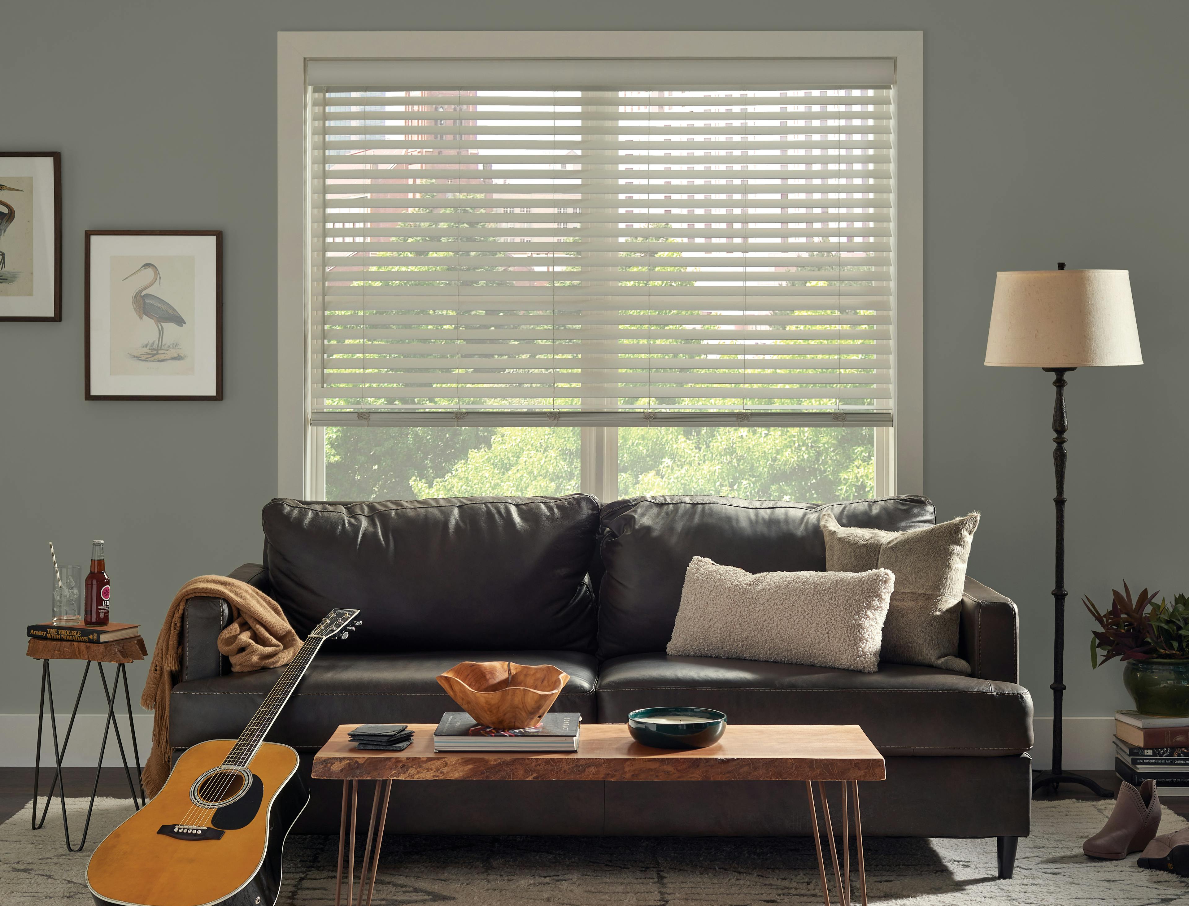 Faux wood blinds in a home music room.